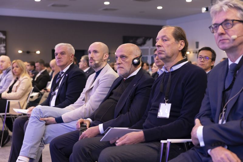 Delegates listening at the UEC Football Forum 2024