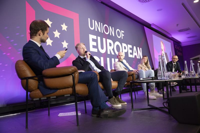 A panel discussion on stage at the UEC Football Forum 2024